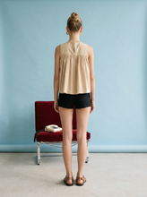 Sleeveless Ruffle Detail Top